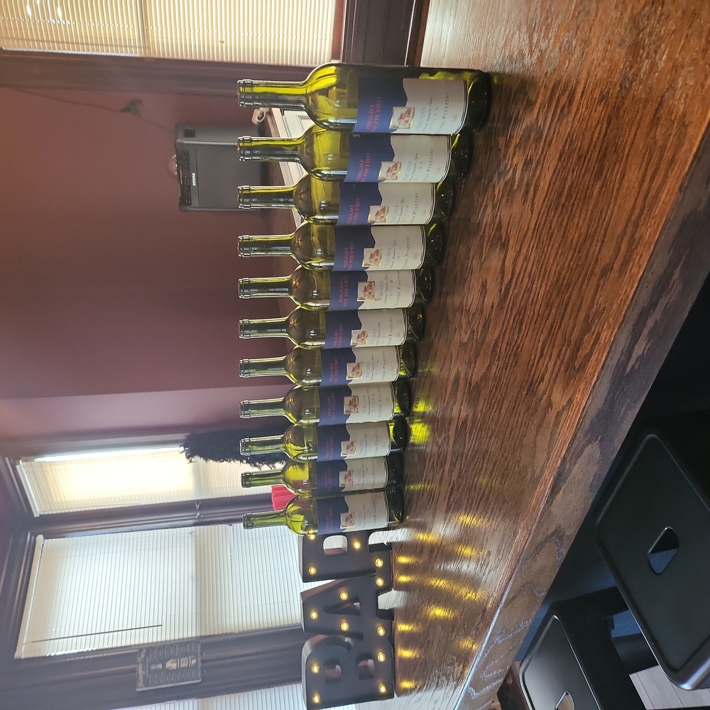 6 WINE BOTTLES Empty.
